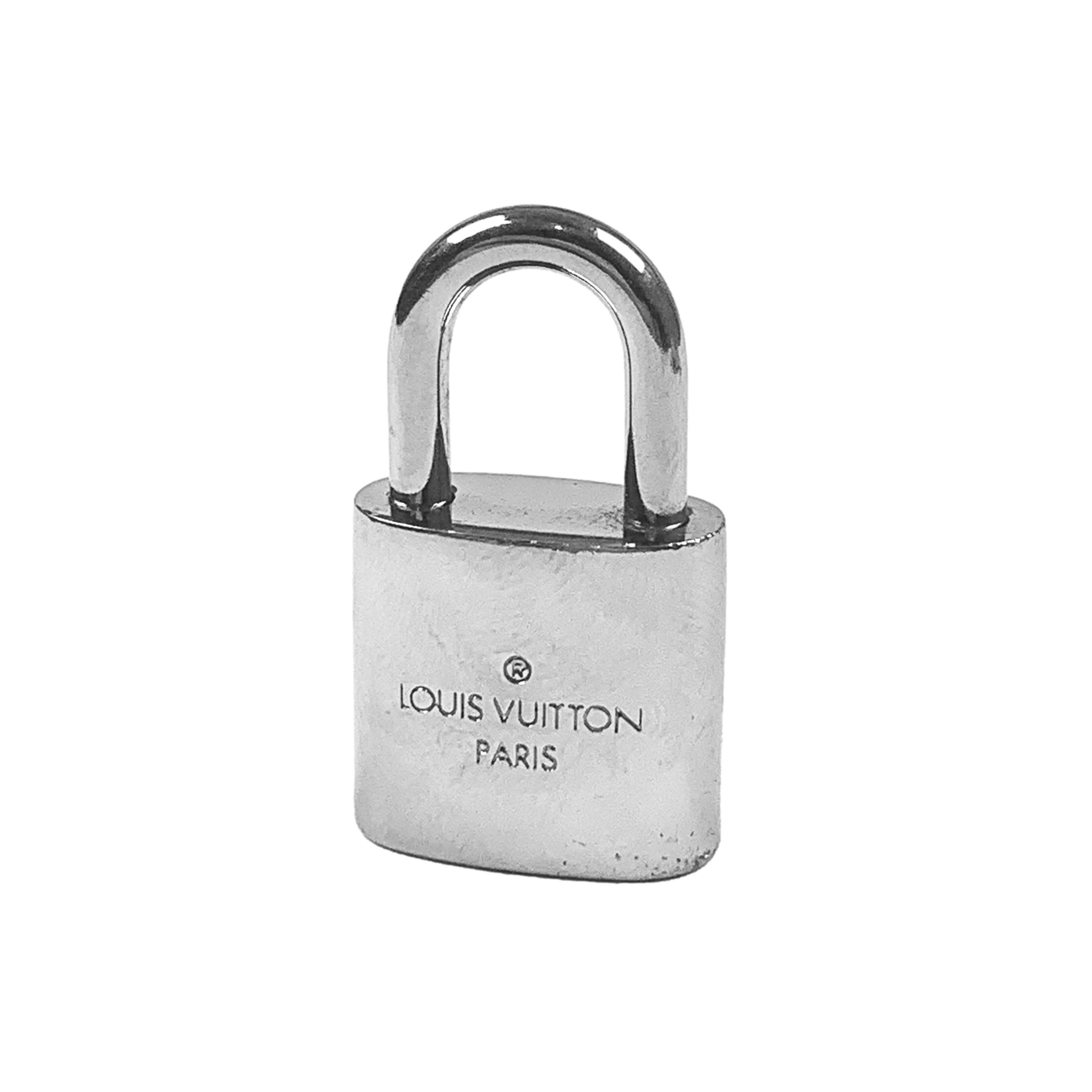 Louis Vuitton Silver Padlock and Key Logo Cufflinks Silvery Metal  ref.138706 - Joli Closet
